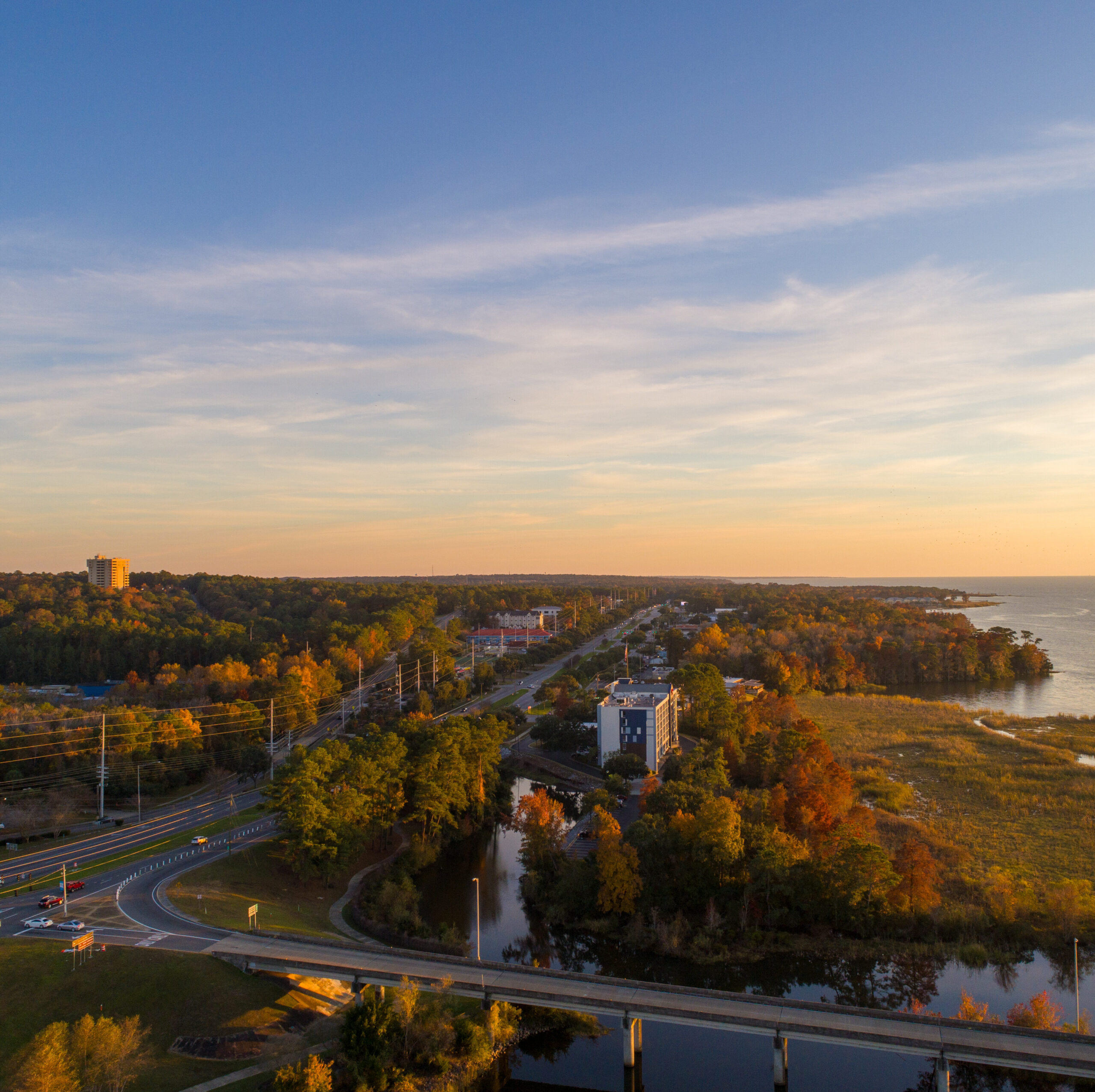 Sunset setting over Daphne Alabama with view of roads and highways and foliage
